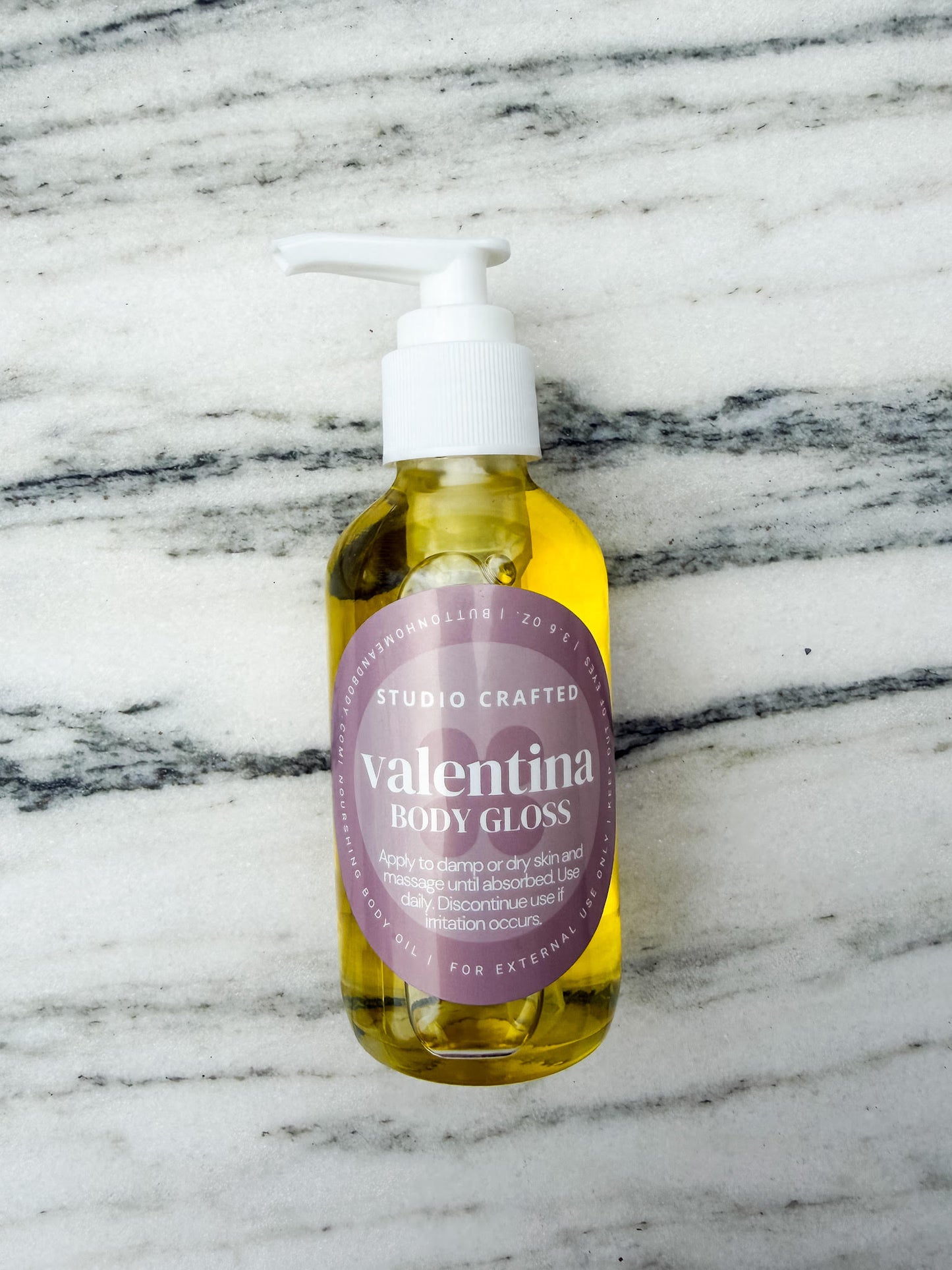 Body Gloss Oil Valentina vanilla fragrance glass bottle
lightweight hydrating body oil with glow finish
vanilla scented body oil for smooth radiant skin