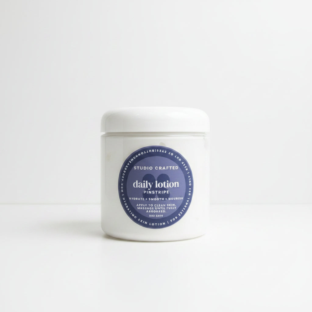 jar of daily lotion in pinstripe men's edit fragrance. 