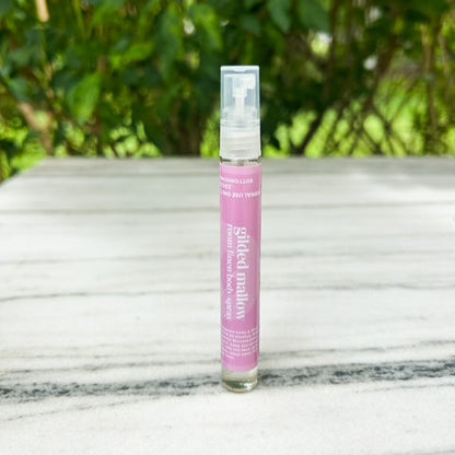 Fine mist slim travel spray with pink label 