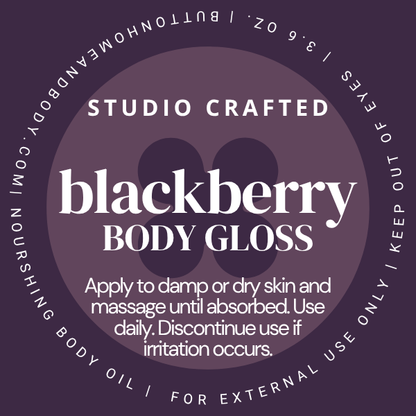 Blackberry Body Gloss body oil label in a rich berry purple with white lettering