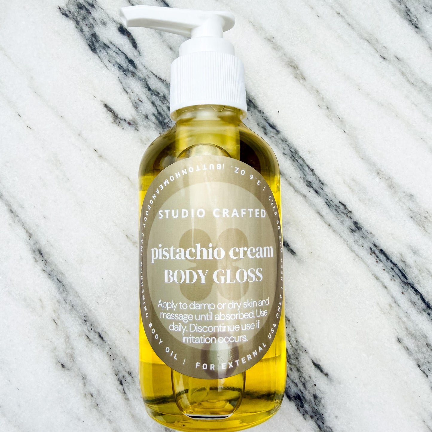 pistachio cream body gloss oil glass bottle
hydrating glow body oil nutty vanilla scent
lightweight body oil with pistachio and almond fragrance