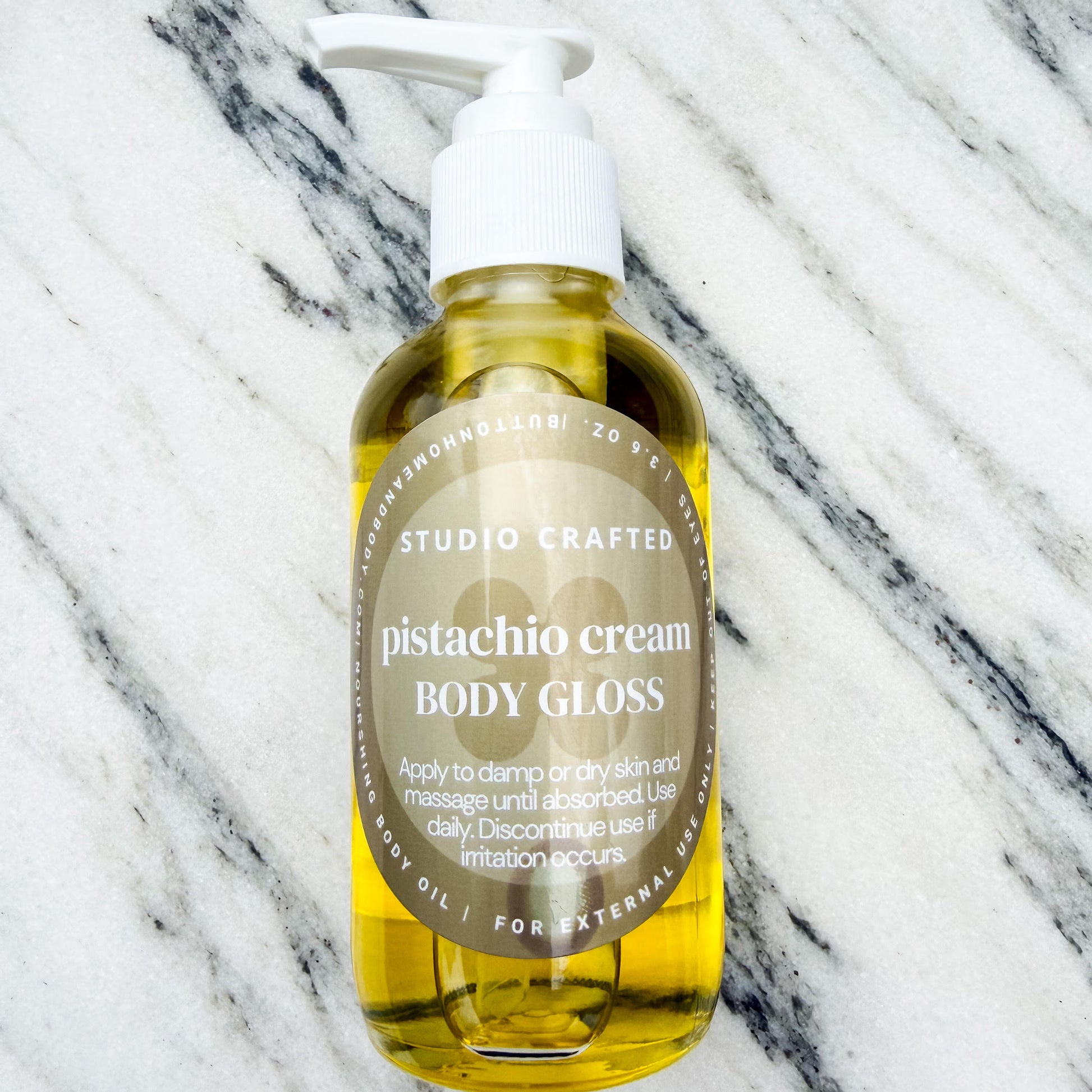 pistachio cream body gloss oil glass bottle
hydrating glow body oil nutty vanilla scent
lightweight body oil with pistachio and almond fragrance