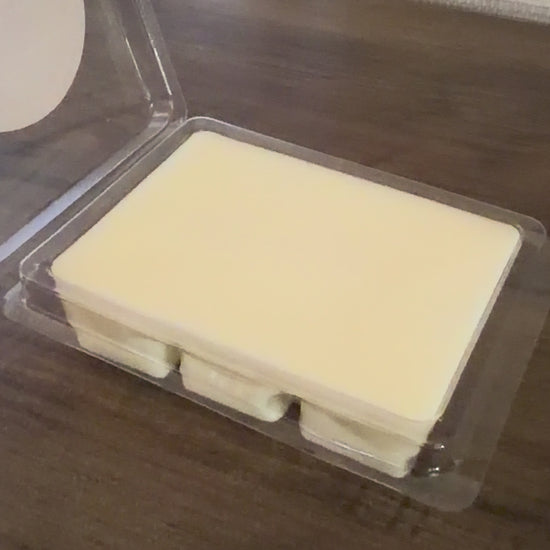Container of wax melts displayed 