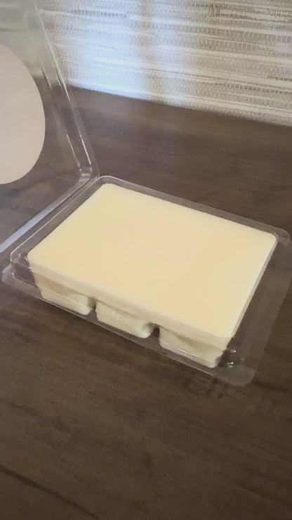 Container of wax melts displayed 